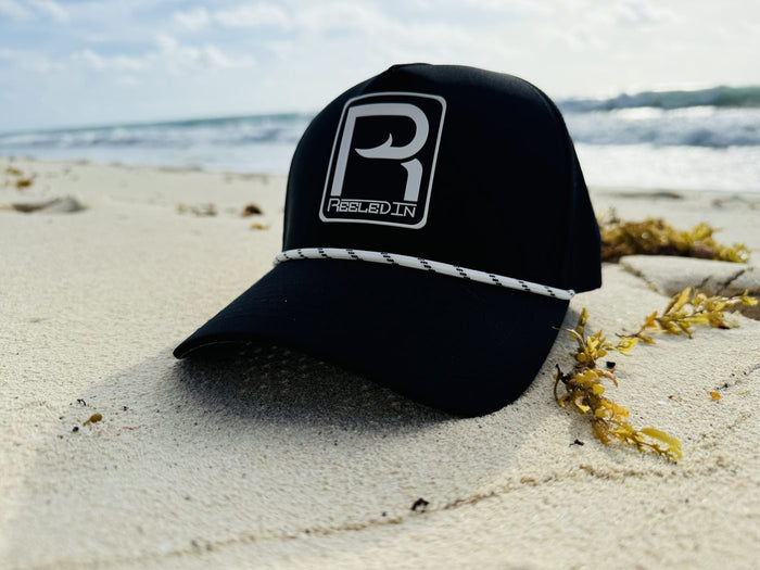 Reeled In rope hat on the sand